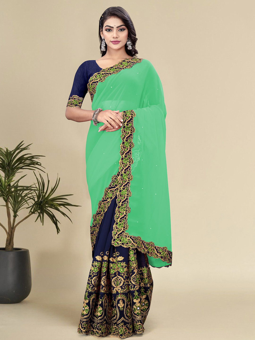 

Celeb Styles Ethnic Motifs Embroidered Pure Georgette Half and Half Saree, Green