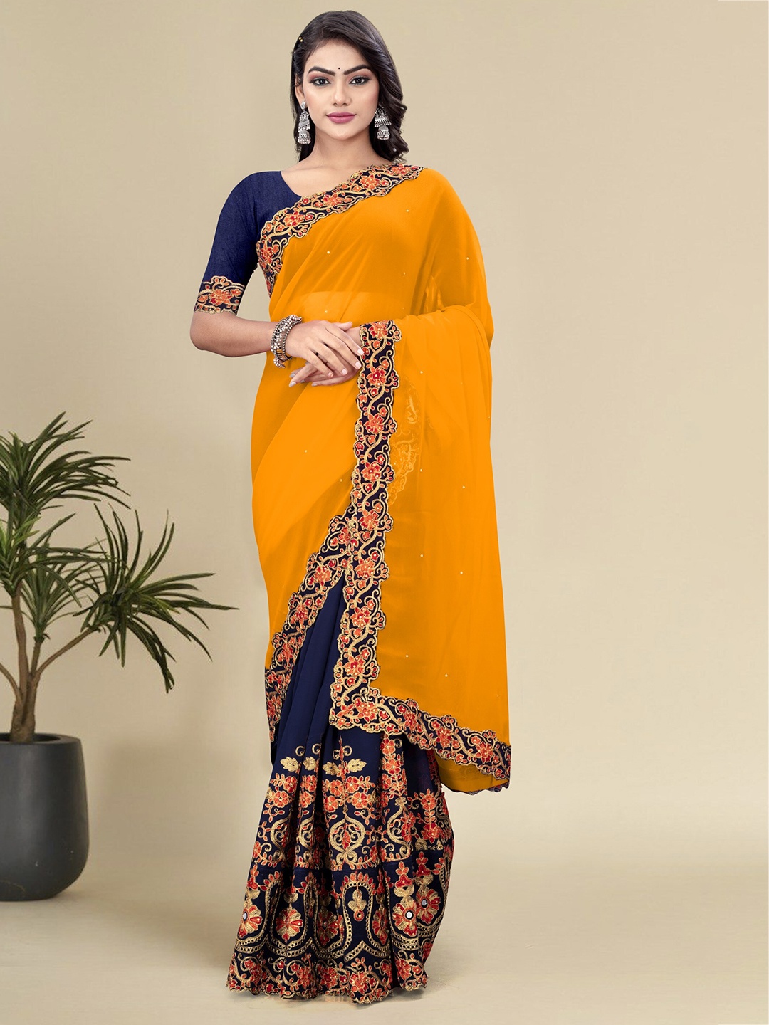 

Celeb Styles Floral Embroidered Pure Georgette Half and Half Saree, Yellow