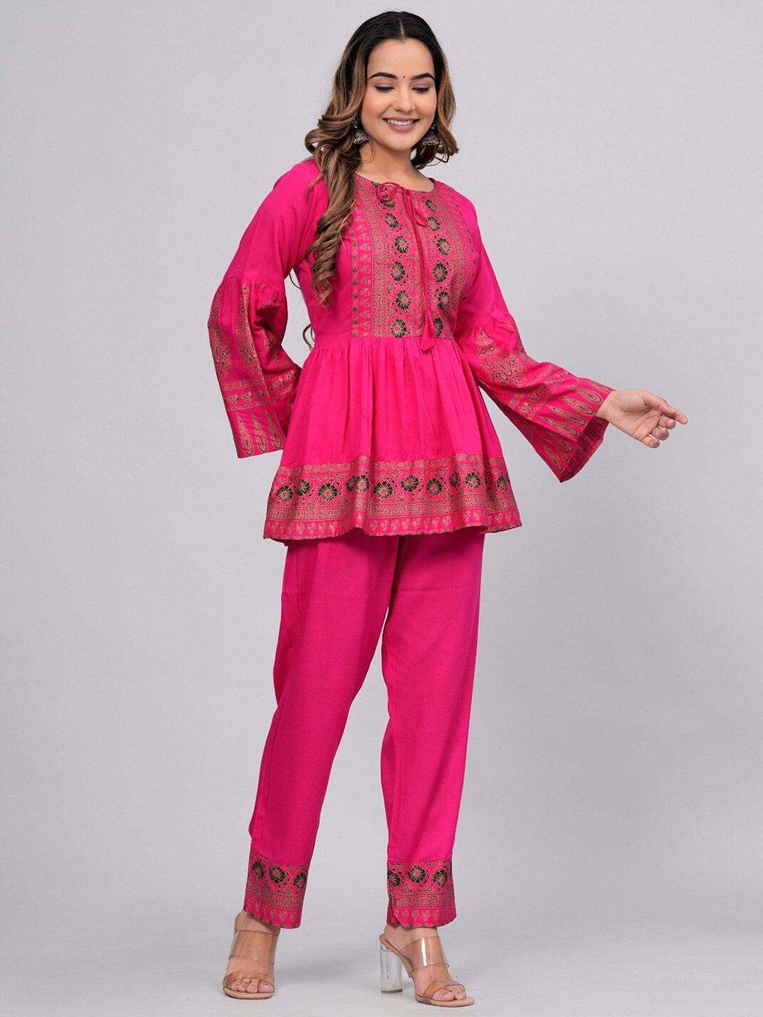 

ANUTTARA FASHIONS Ethnic Motifs Printed Tie-Up Neck Flared Sleeve A-Line Top, Pink