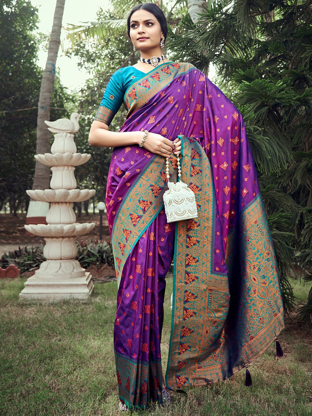 

Satrani Ethnic Motifs Woven Design Zari Banarasi Saree, Purple