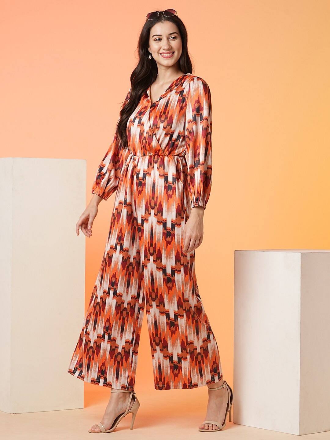 

Globus White & Orange Printed V-Neck Basic Jumpsuit