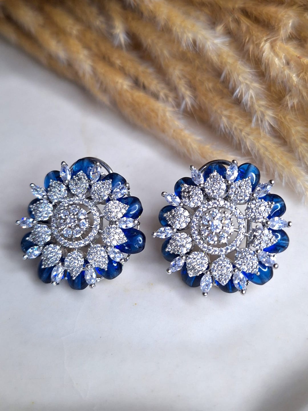

XAGO Silver Plated Cubic Zirconia Studded Floral Stud Earrings