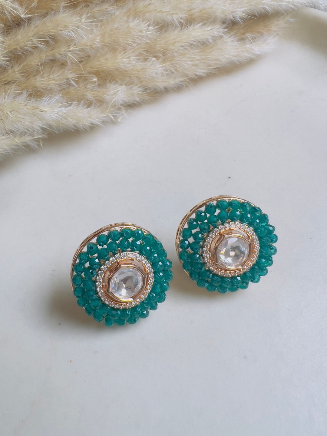 

XAGO Gold Plated Stones Studded & Beaded Circular Stud Earrings