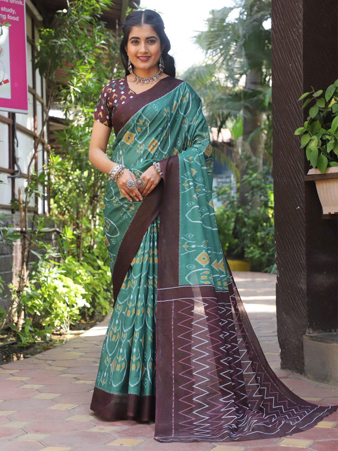 

Saree mall Green Ethnic Motifs Printed Pure Cotton Ikat Sarees