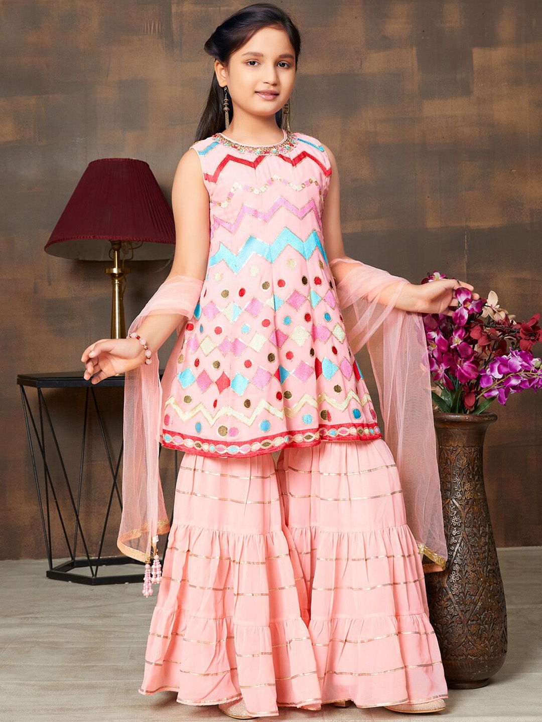 

Aarika Girls Embroidered Regular Kurti With Sharara, Peach