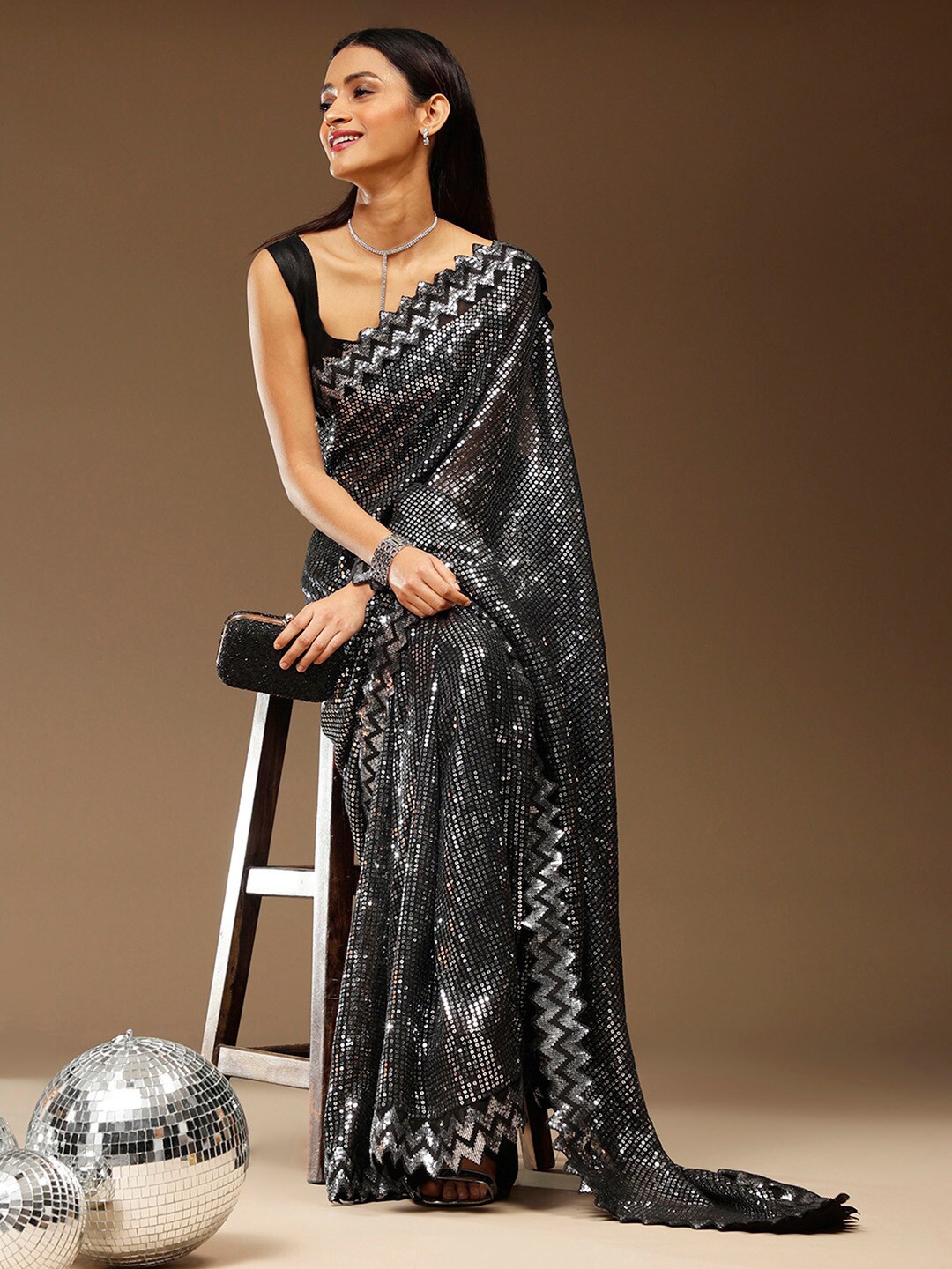 

Sangria Black Embellished Pure Georgette Saree