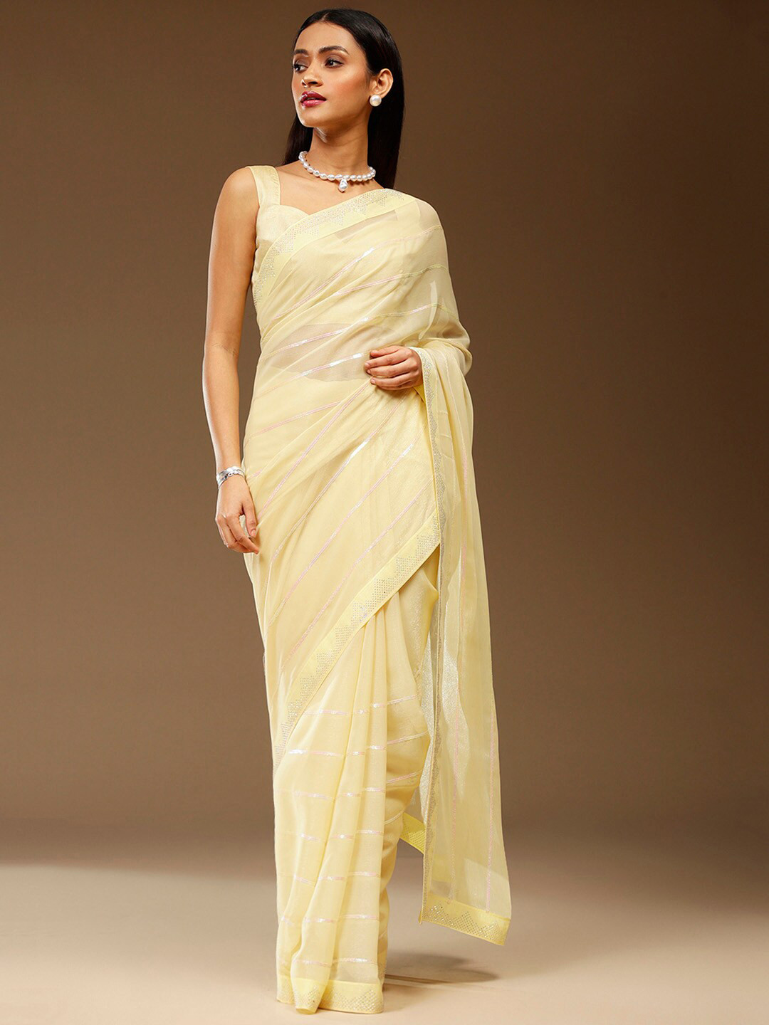 

Sangria Yellow Embellished Pure Chiffon Saree
