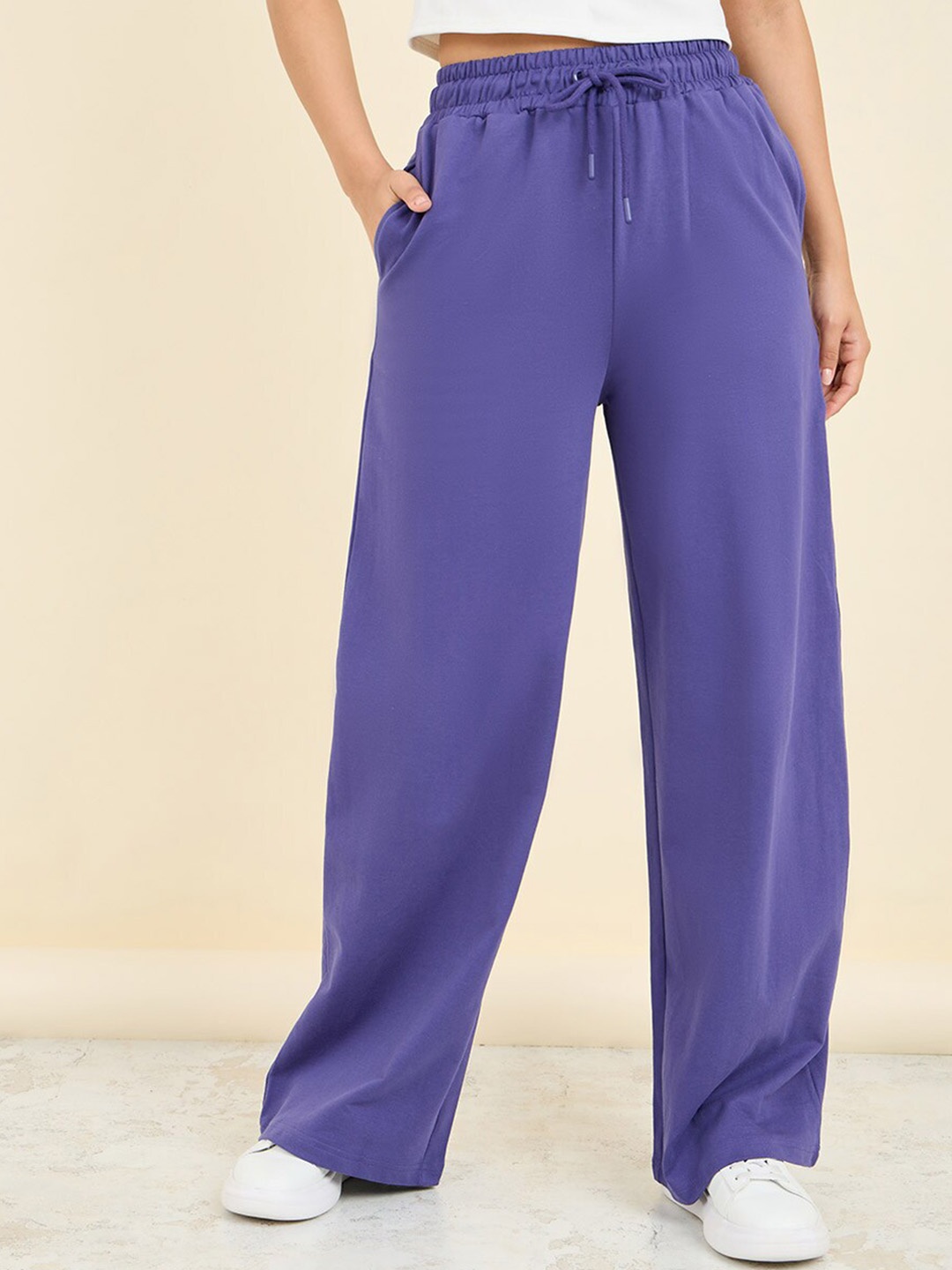 

Styli Women Flared Fit Track Pants, Purple