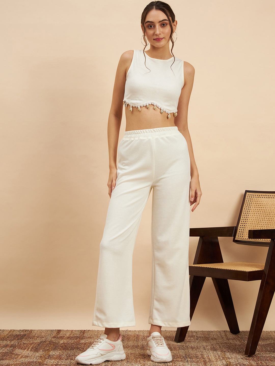 

KASSUALLY Off-White Ribbed Round Neck Sleeveless Crop Top With Trousers
