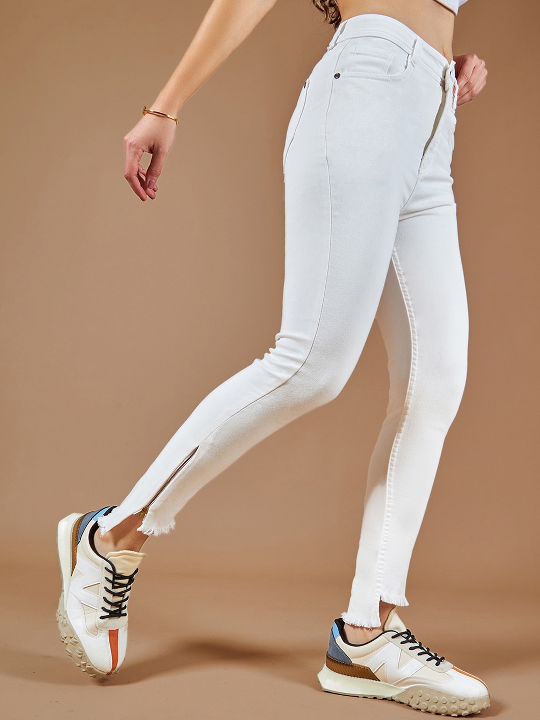 

The Roadster Lifestyle Co Women Skinny High Rise Fringed Hemline Stretchable Denim Jeans, White