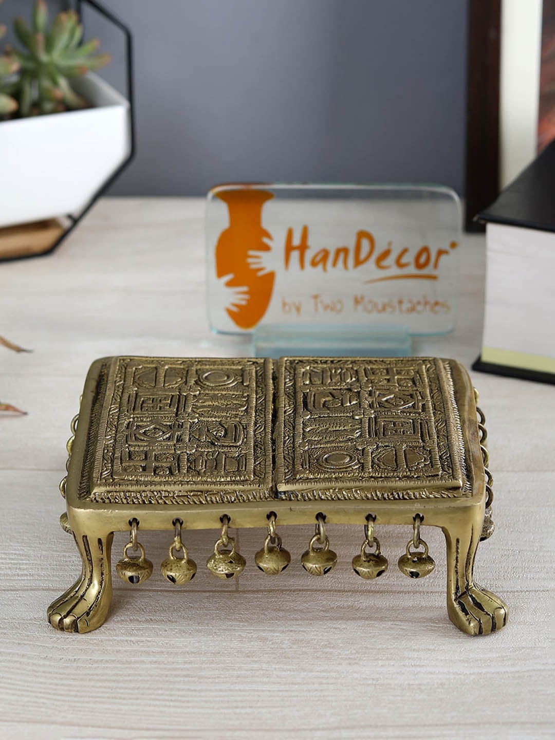 

Two Moustaches Brown Brass Swastika Engraved Chowki with Bells
