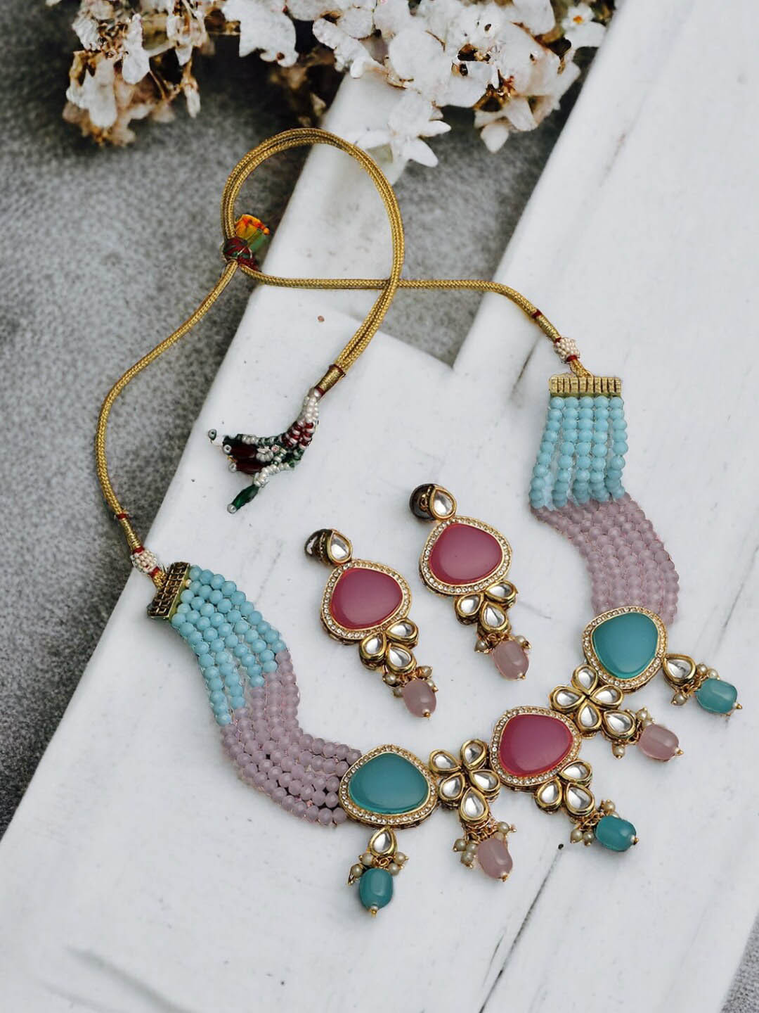 

ASMITTA JEWELLERY Gold Plated Kundan Studded & Beaded Jewellery Set