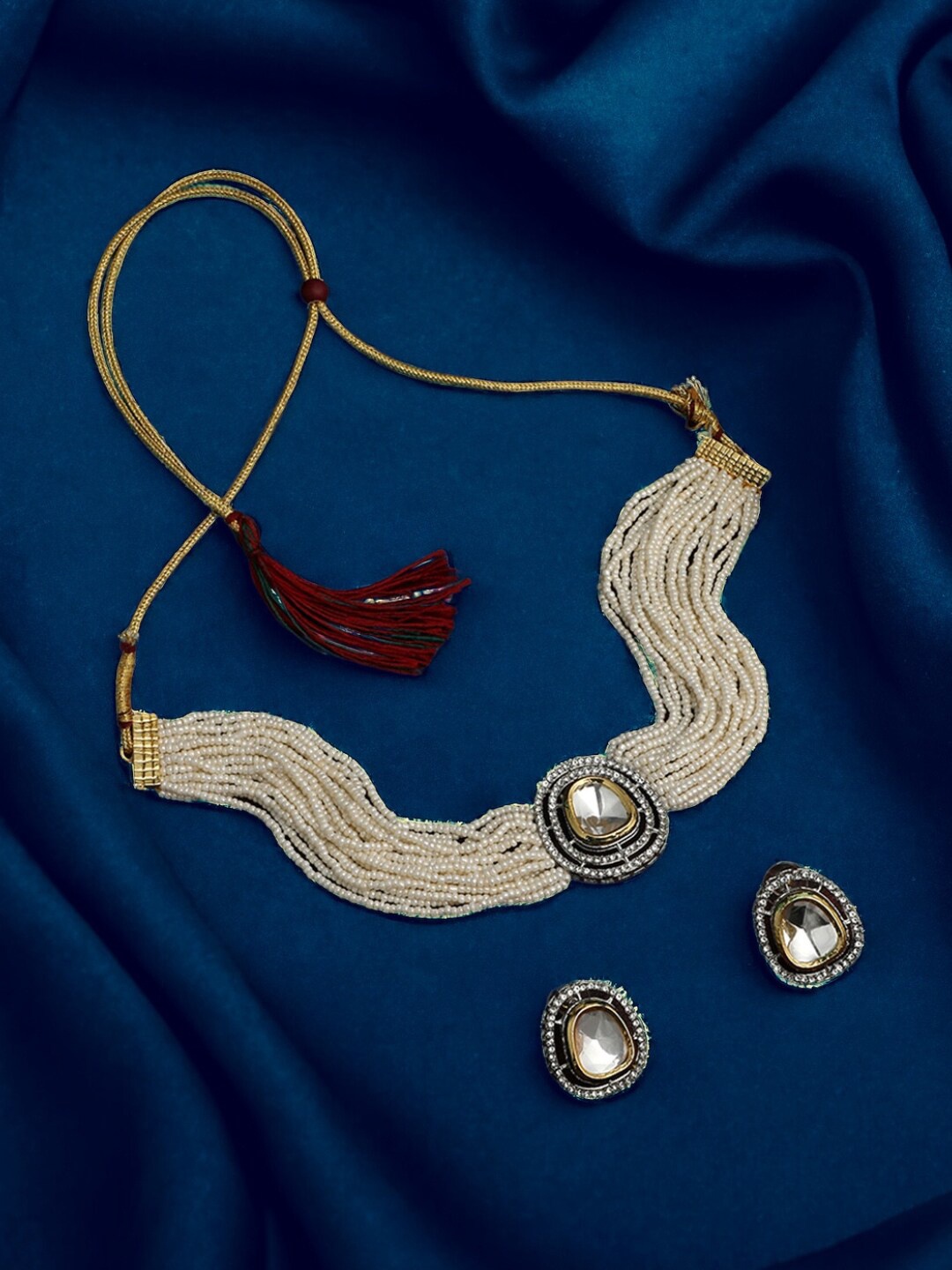 

ASMITTA JEWELLERY Gold Plated Kundan Stones Studded & Beaded Jewellery Set