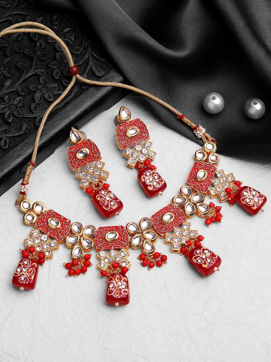 

ASMITTA JEWELLERY Gold Plated Kundan Studded & Beaded Jewellery Set