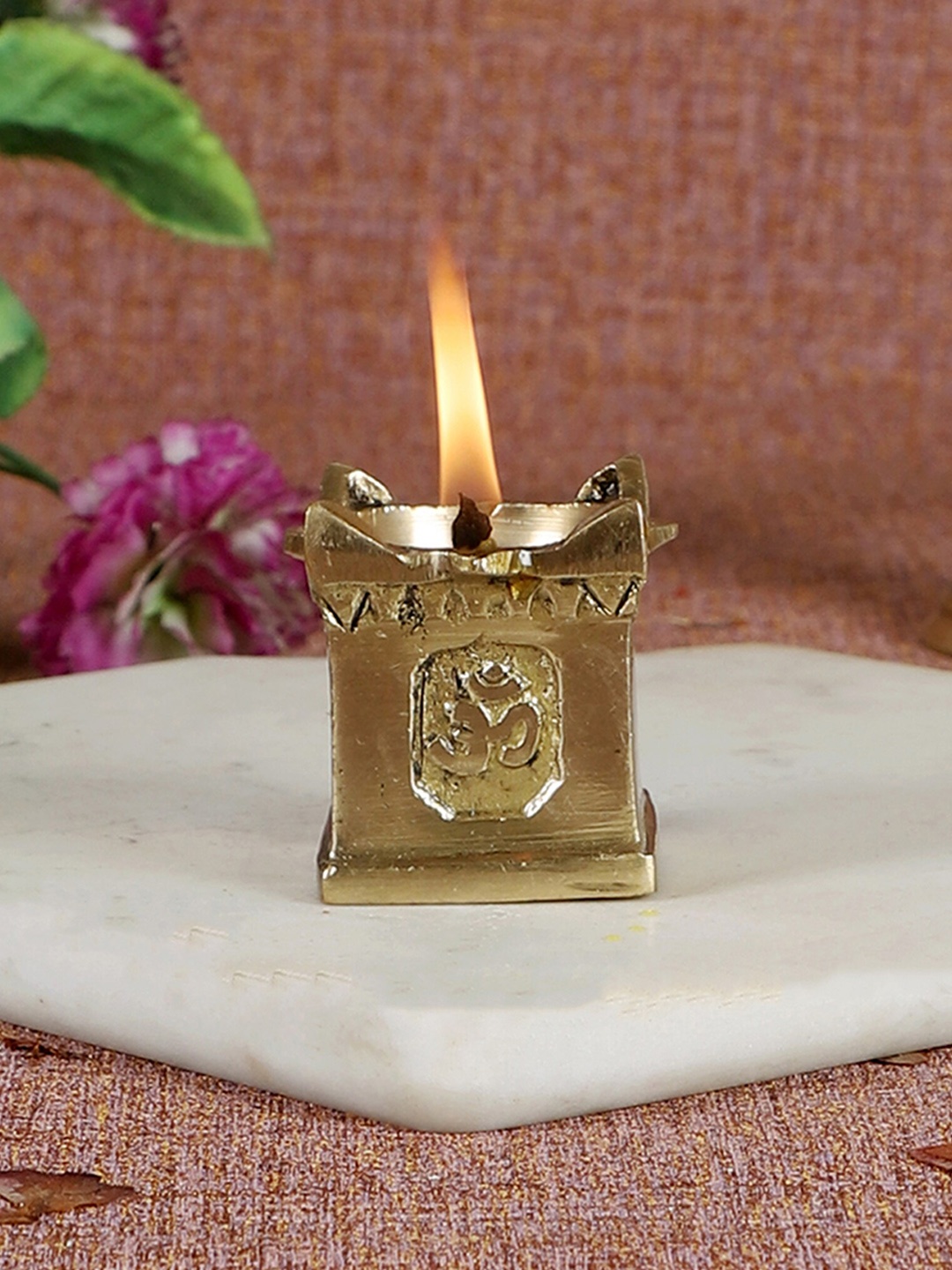 

Two Moustaches Brown Textured Brass Tulasi Diya