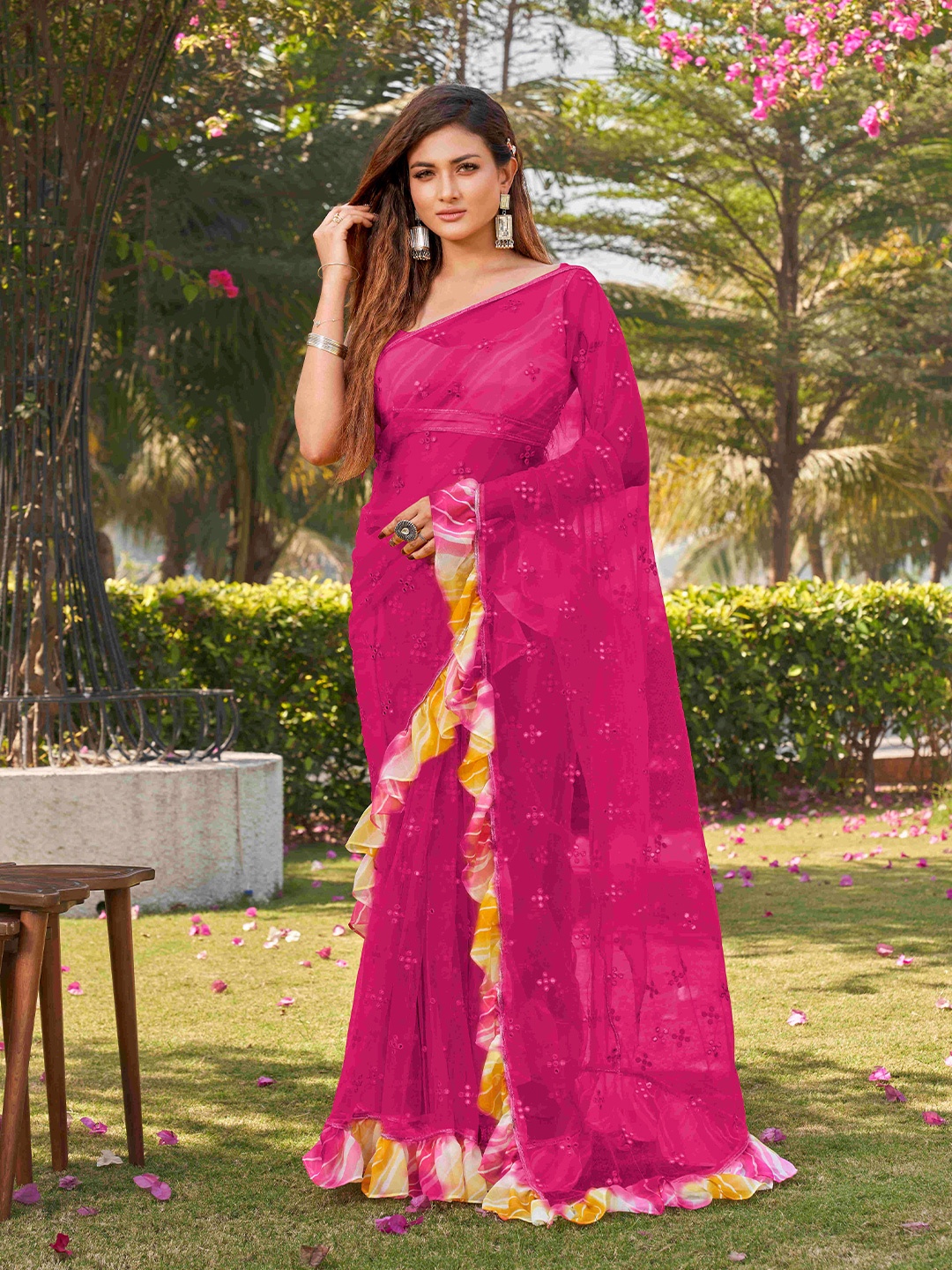 

Tikhi Imli Pink Floral Embroidered Mirror Work Ruffles Net Saree