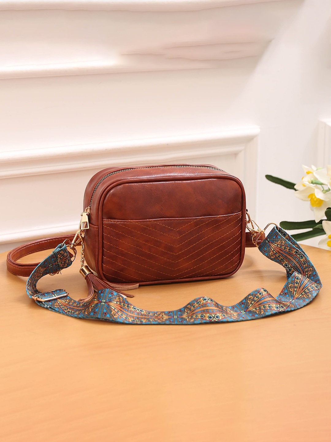 

Diva Dale Textured Tasselled Structured Sling Bag, Brown