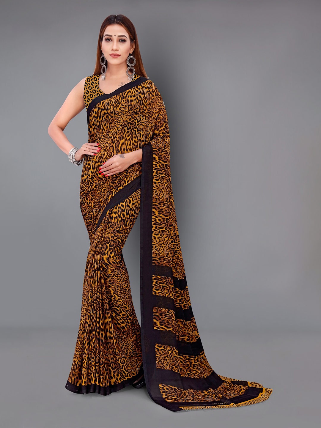 

Moda Rapido Abstract Printed Saree, Mustard