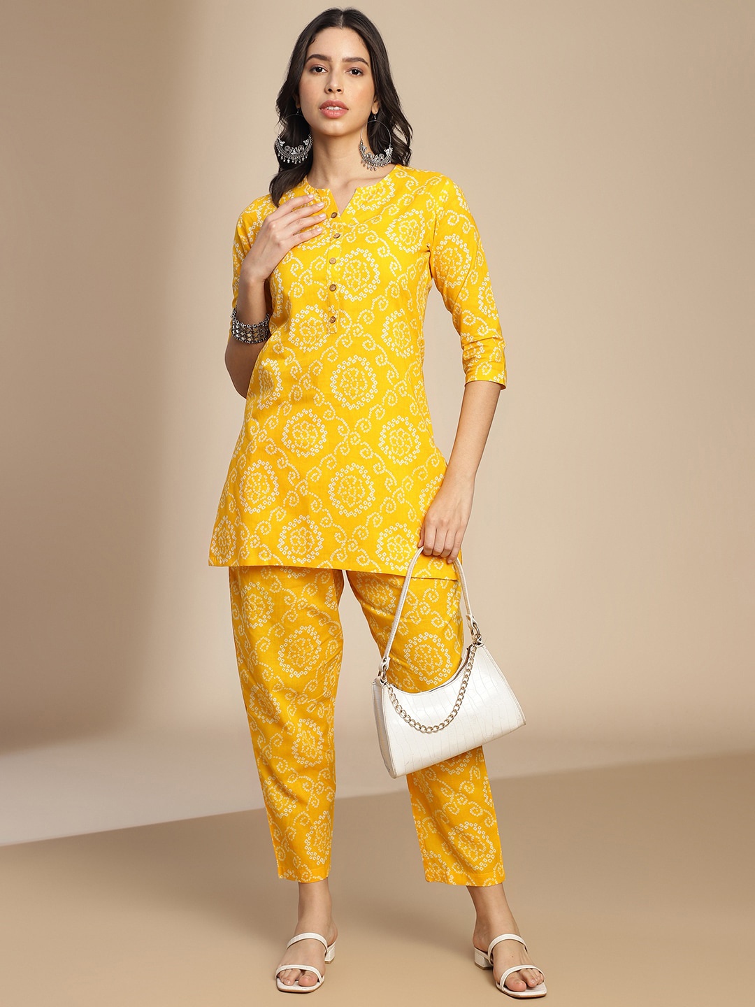 

Saanjh Yellow Bandhani Printed Tunic & Trousers