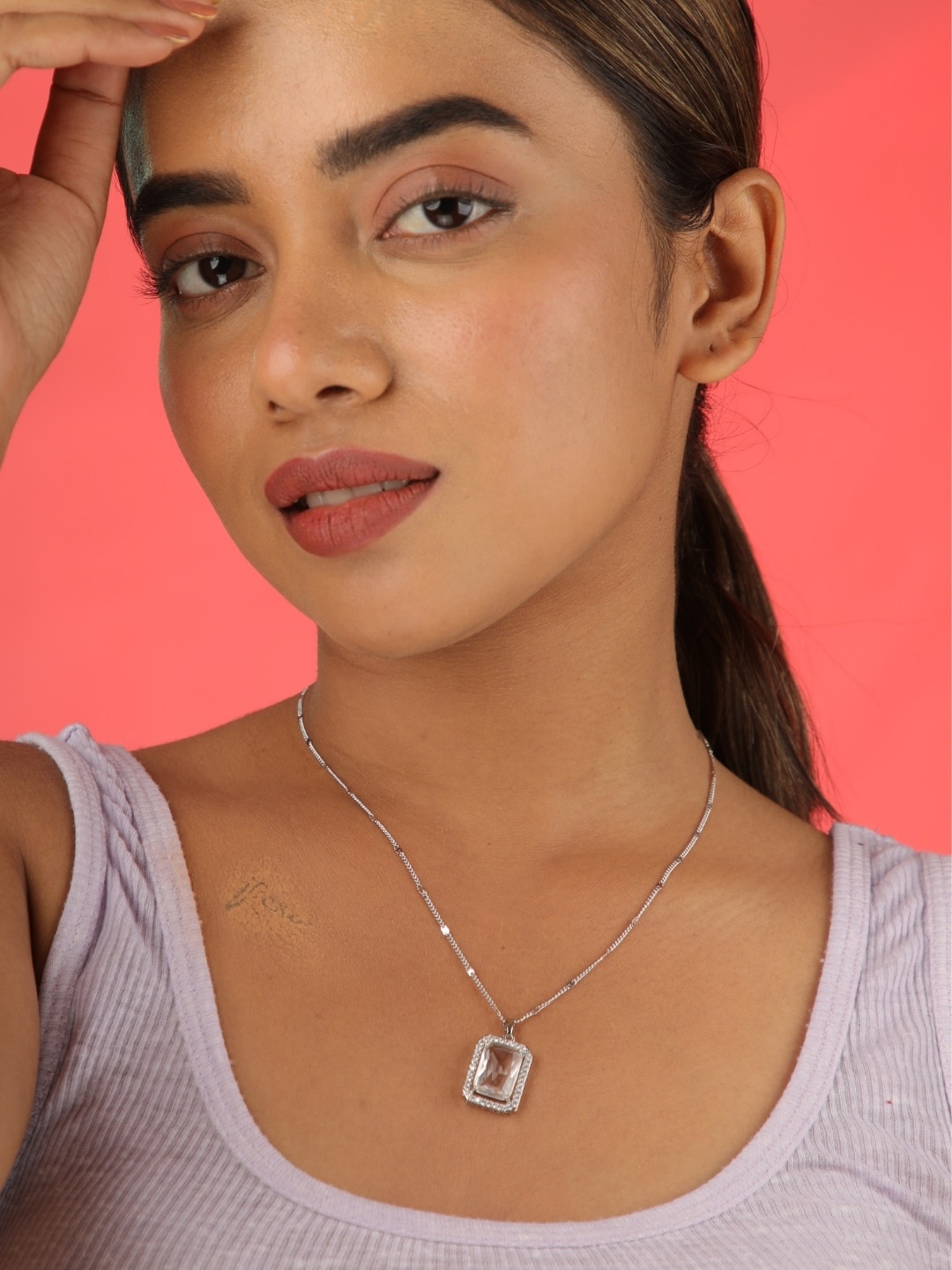 

Zeraki Jewels Silver Plated Crystal Studded Pendant With Chain