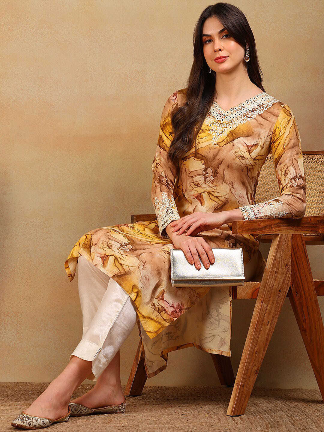 

AHIKA Abstract Printed Beads And Stones V-Neck Three-Quarter Sleeves A-Line Kurta, Mustard