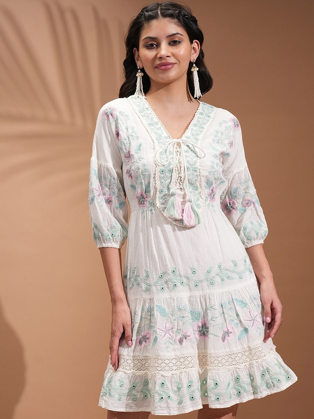 

Vishudh White Floral Embroidered Puff Sleeves Tasseled Fit and Flare Ethnic Dresses