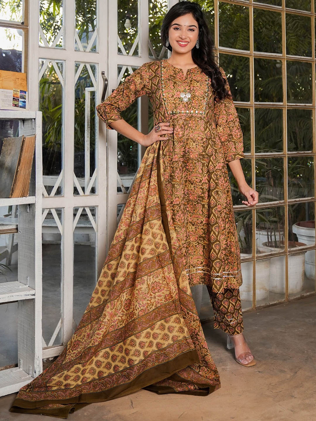 

Vbuyz Women Floral Embroidered Regular Mirror Work Pure Cotton Kurta with Trousers & With Dupatta, Brown