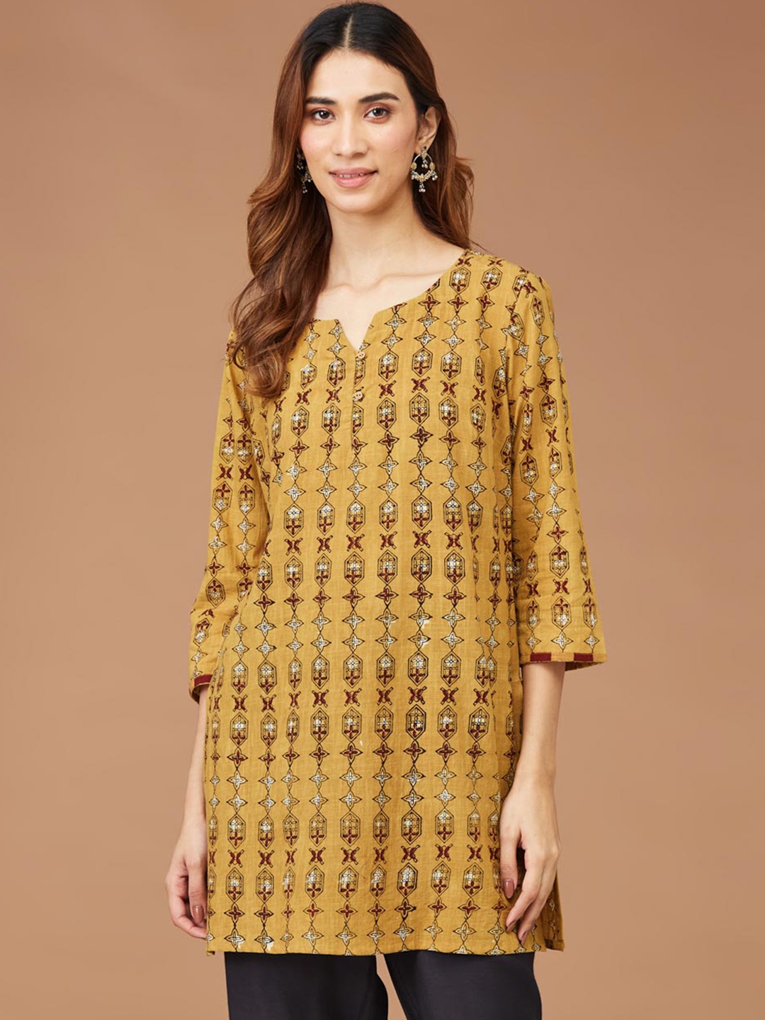 

Fabindia Women Geometric Embroidered Flared Sleeves Thread Work Kurta, Mustard