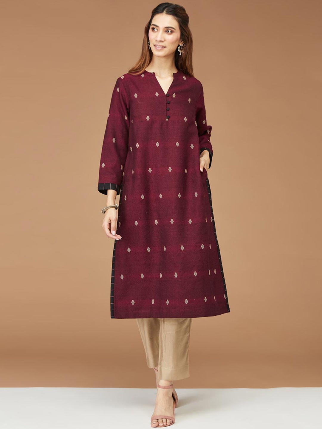 

Fabindia Geometric Embroidered Woollen Straight Kurta, Maroon