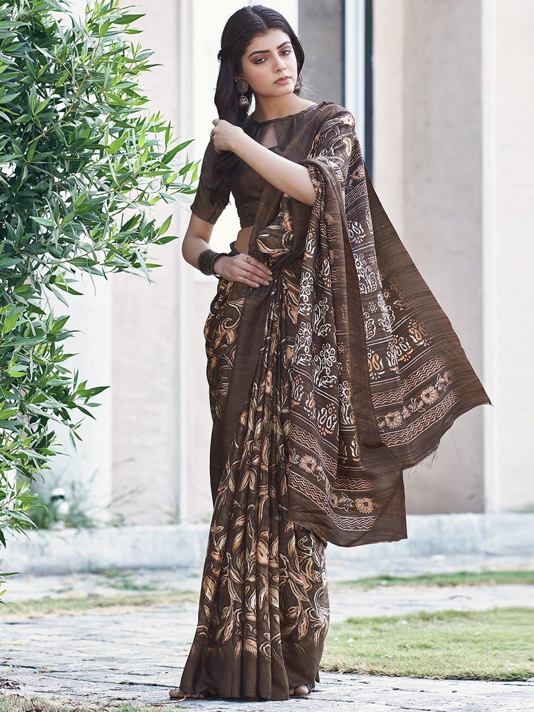 

Mitera Brown Floral Printed Muga Saree