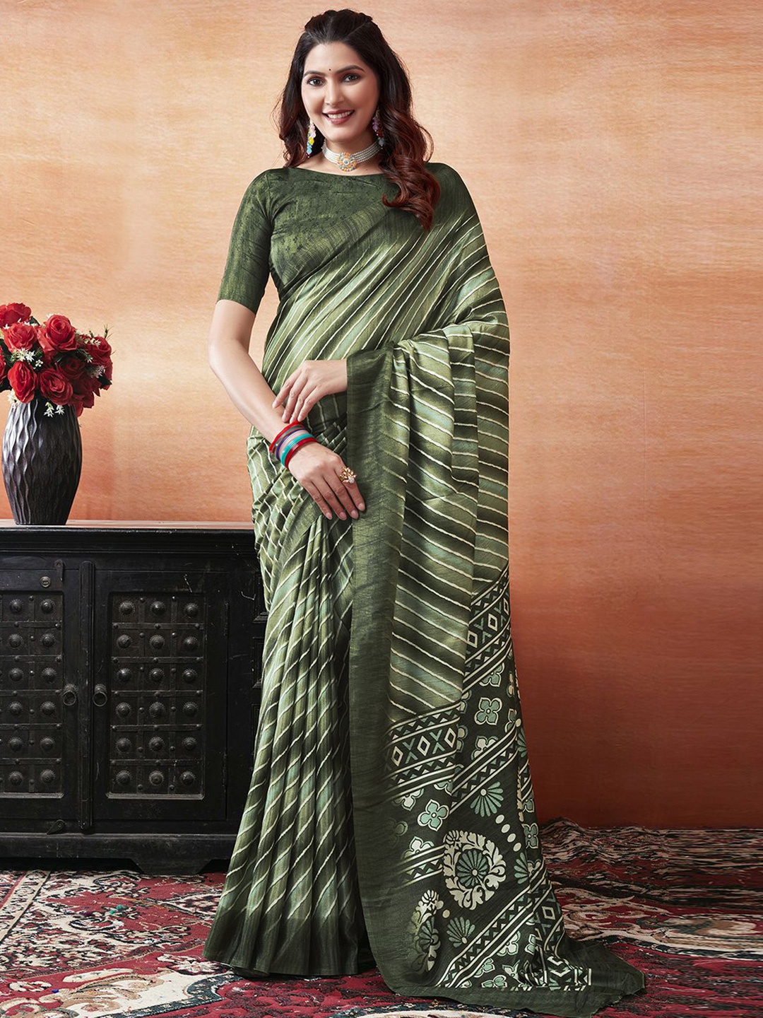 

Mitera Green Leheriya Printed Saree