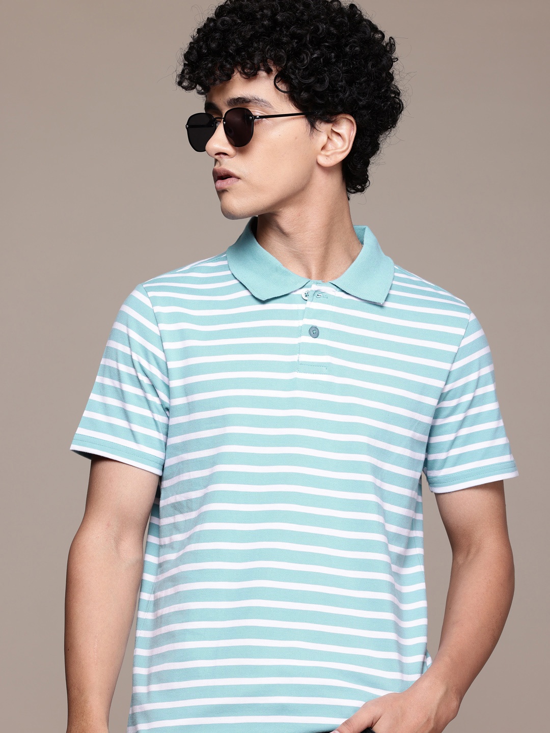 

The Roadster Lifestyle Co. Men Striped Polo Collar T-shirt, Blue