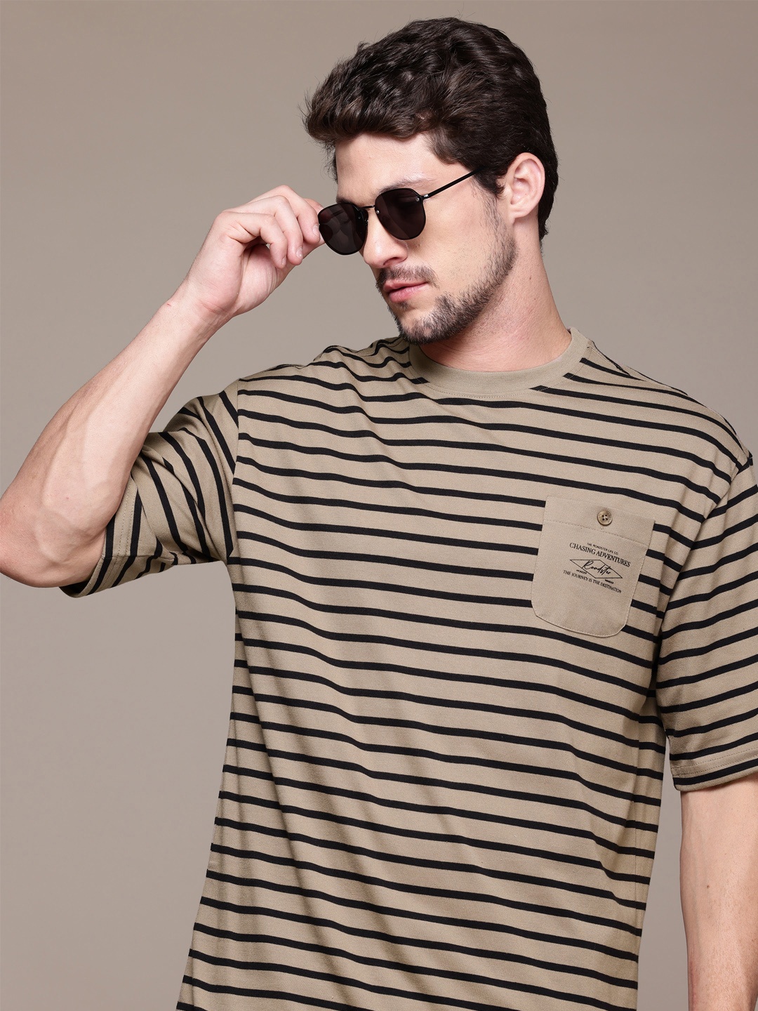 

The Roadster Lifestyle Co. Men Striped Relaxed Fit T-shirt, Brown