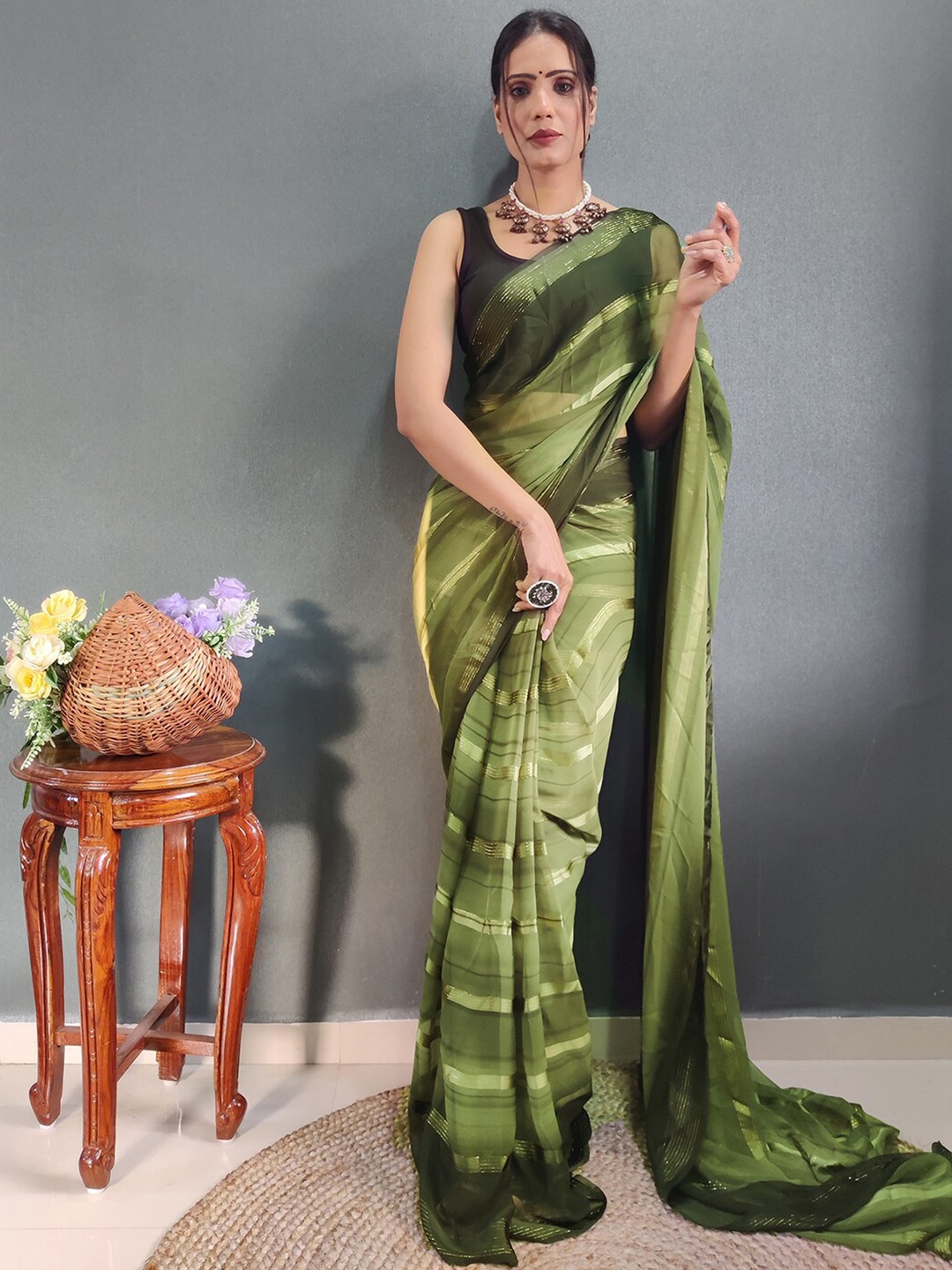 

Mitera Green Striped Zari Leheriya Ready To Wear Saree