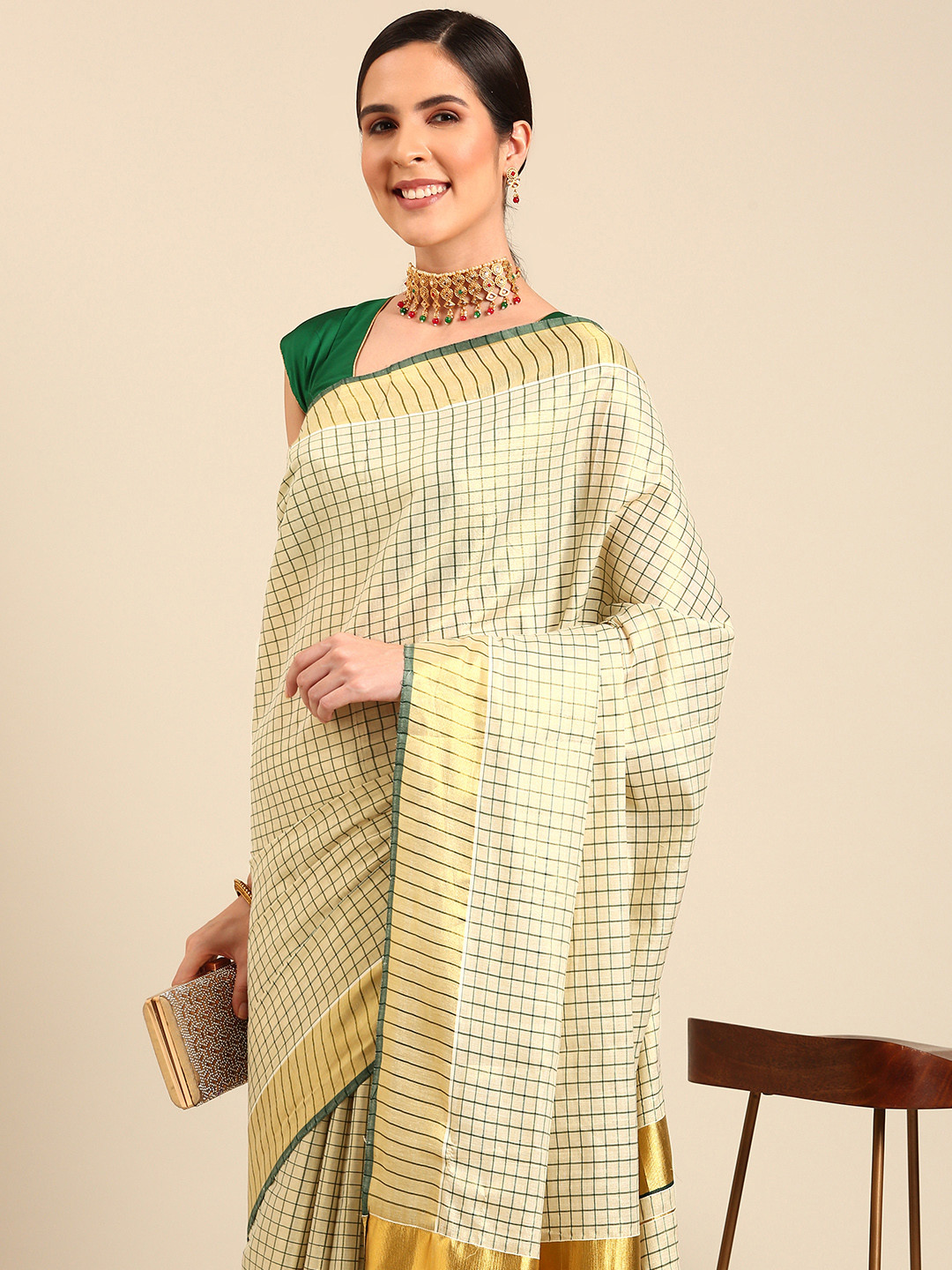 

Kalyan Silks Checked Tissue Kasavu Saree, Gold