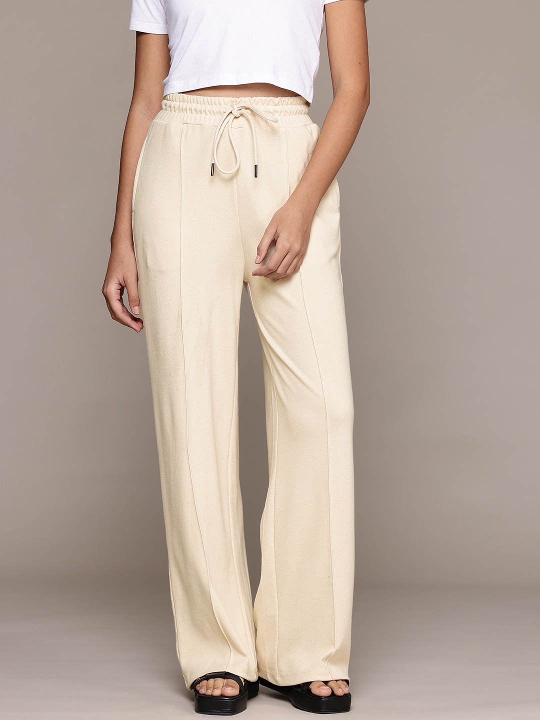 

The Roadster Lifestyle Co Women Regular Fit Trousers, Cream