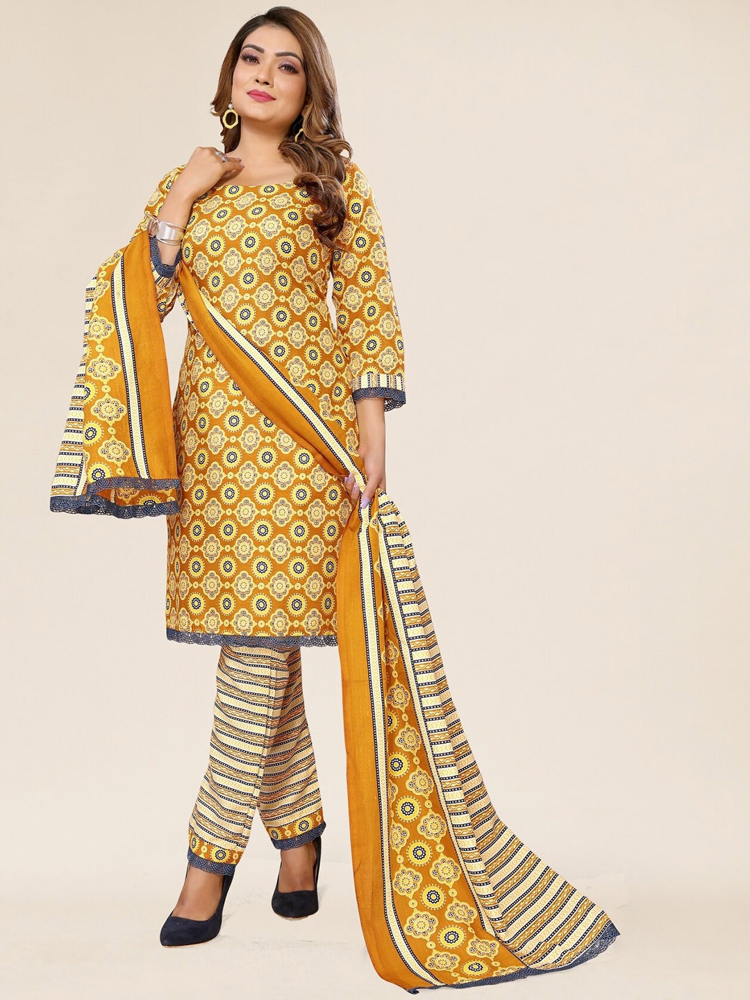 

TITANIUM SILK INDUSTRIES PVT. LTD. Printed Regular Kurta with Trousers & Dupatta, Mustard