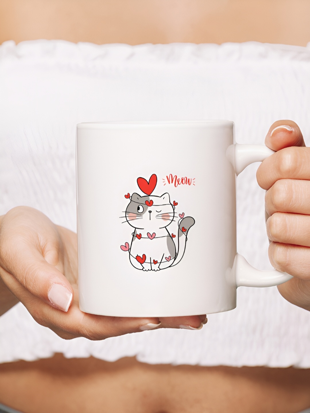 

The Decor Lane White & Black Printed Ceramic Glossy Mug 325 ml