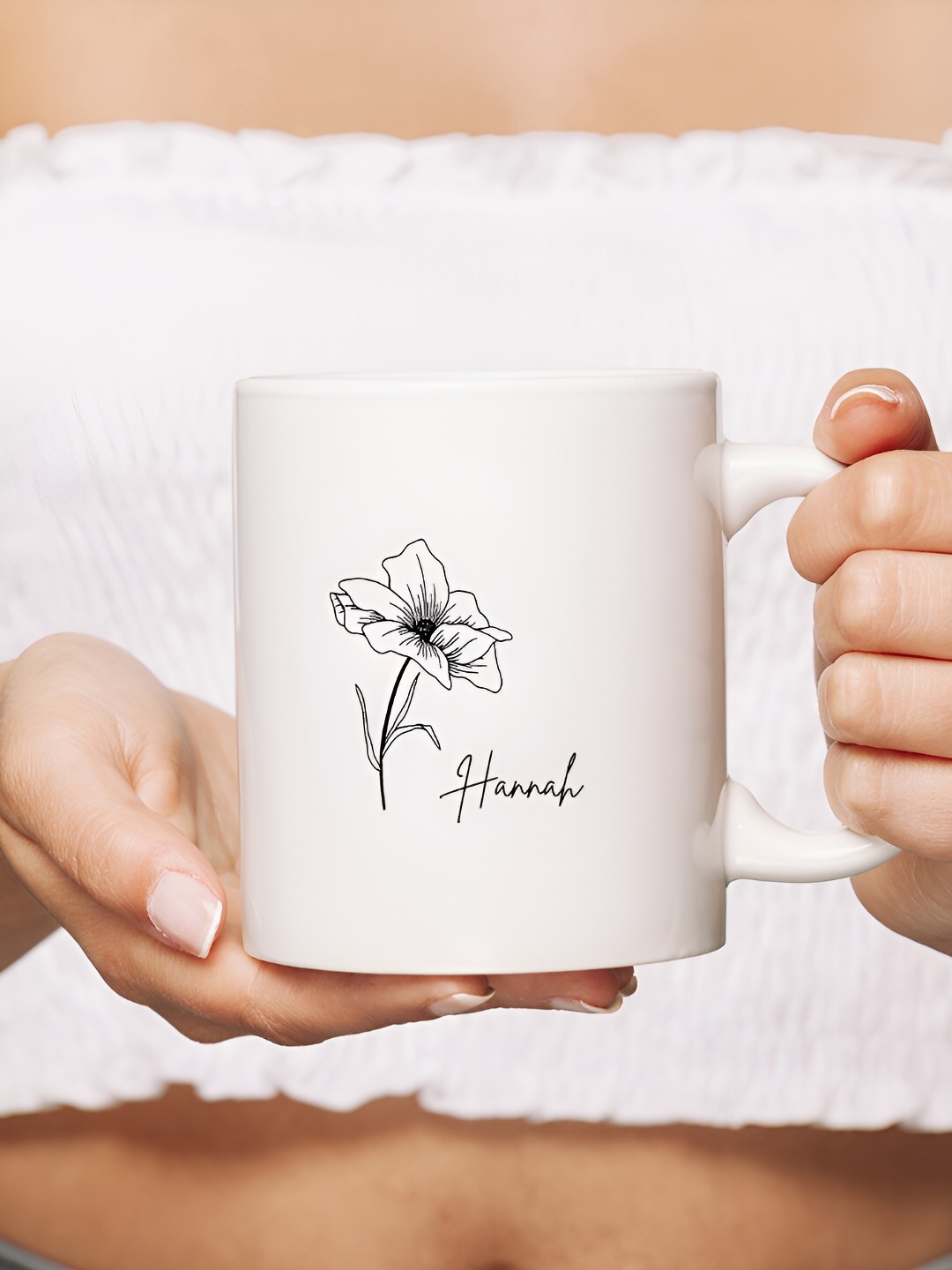 

The Decor Lane White & Black Printed Ceramic Glossy Mug 325 ml