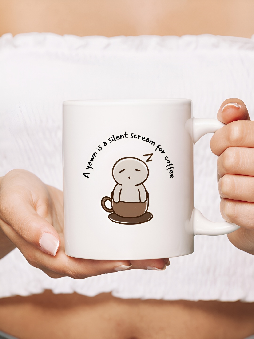 

The Decor Lane White & Black Printed Ceramic Glossy Mug 325 ml
