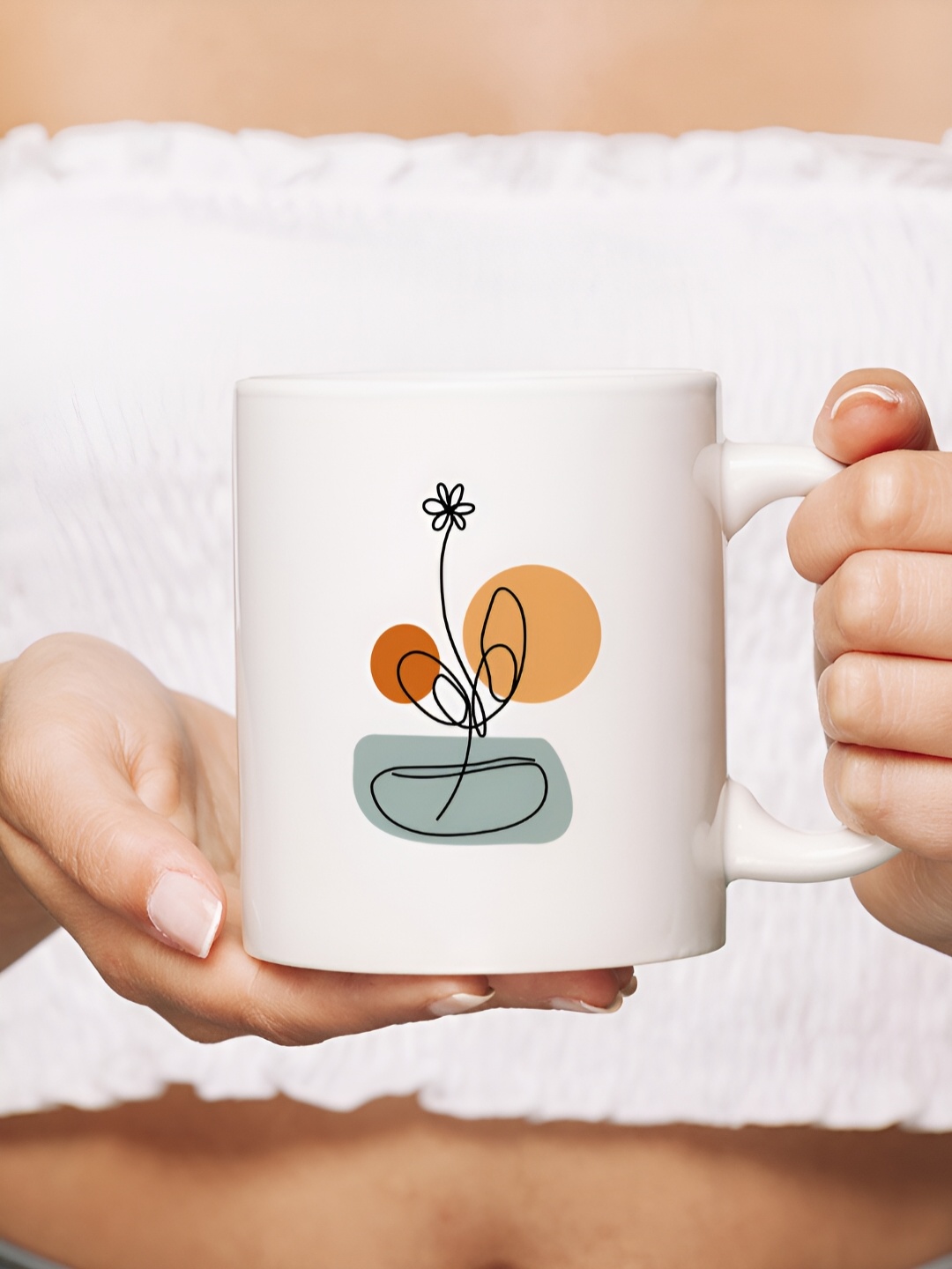 

The Decor Lane White & Black Printed Ceramic Glossy Mug 325 ml