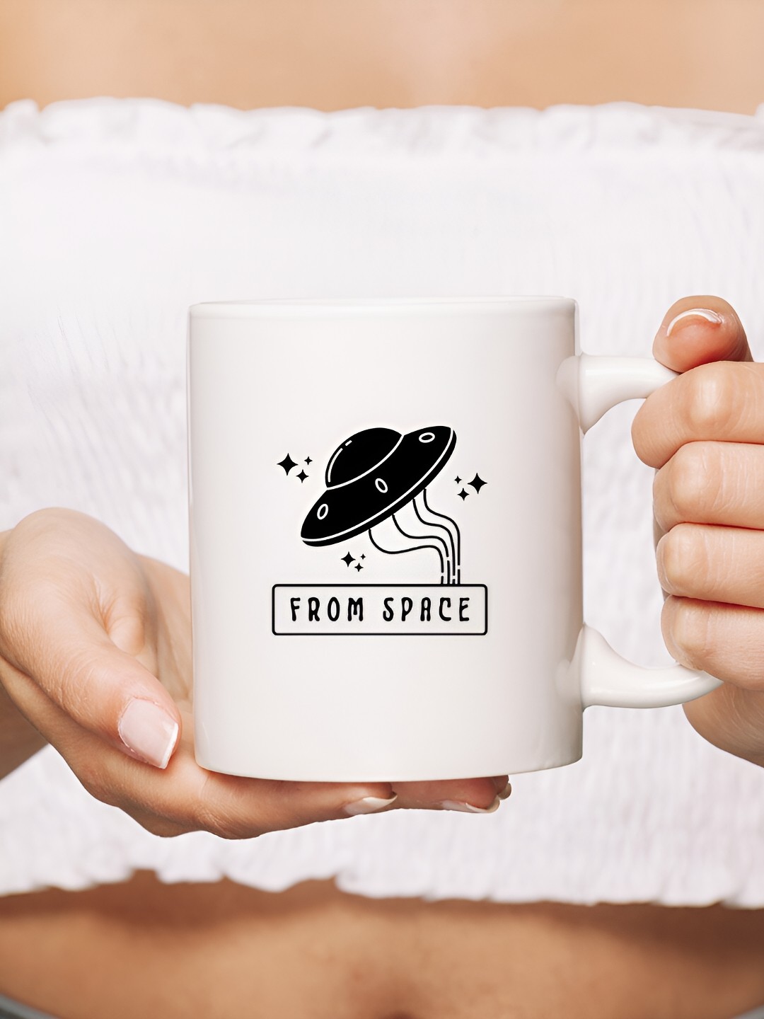 

The Decor Lane White & Black Printed Ceramic Glossy Mug 325 ml