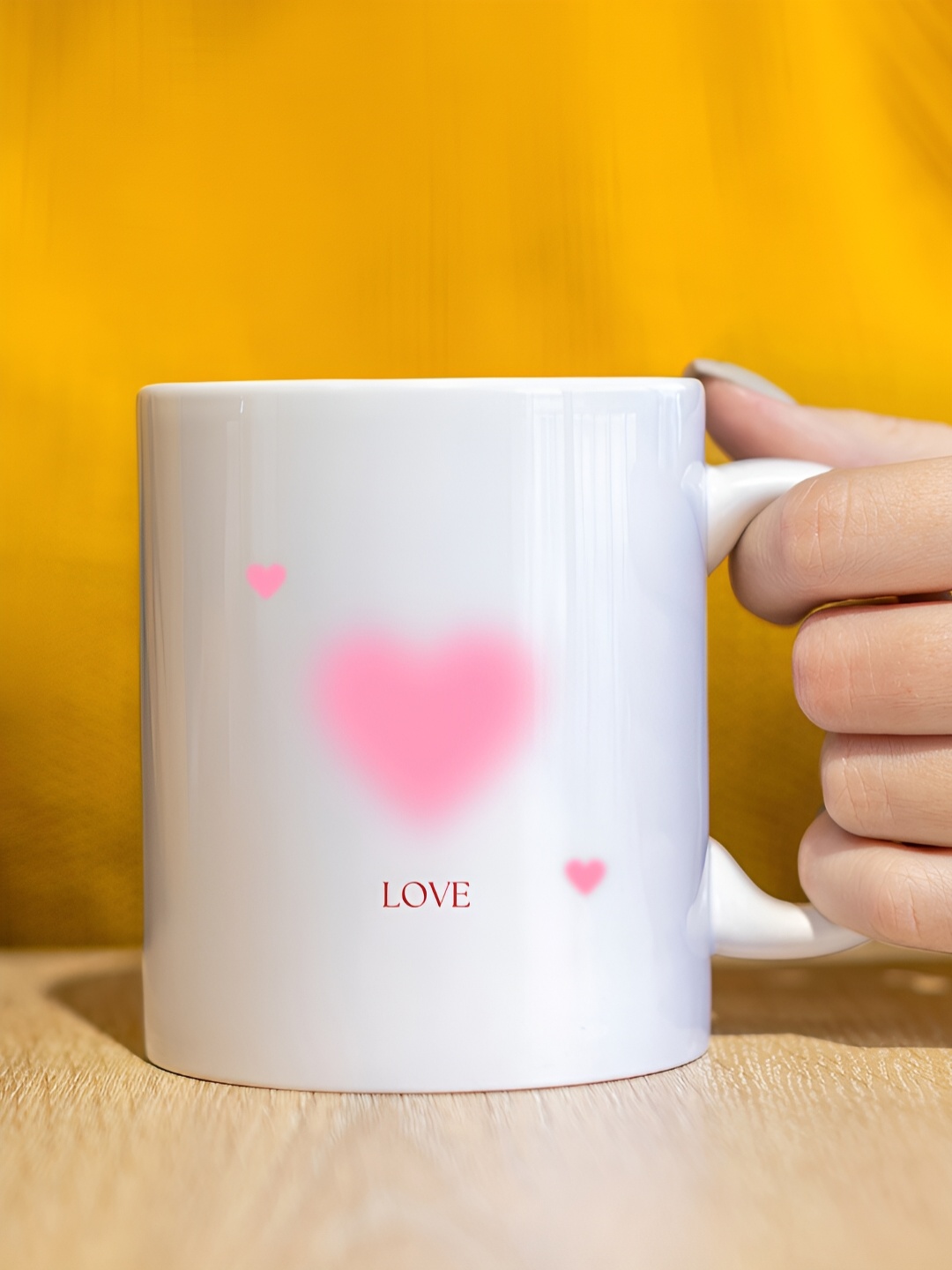 

The Decor Lane White & Pink Printed Ceramic Glossy Mug 325 ml