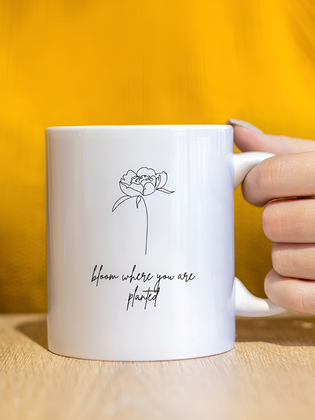 

The Decor Lane White & Black Printed Ceramic Glossy Mug 325 ml