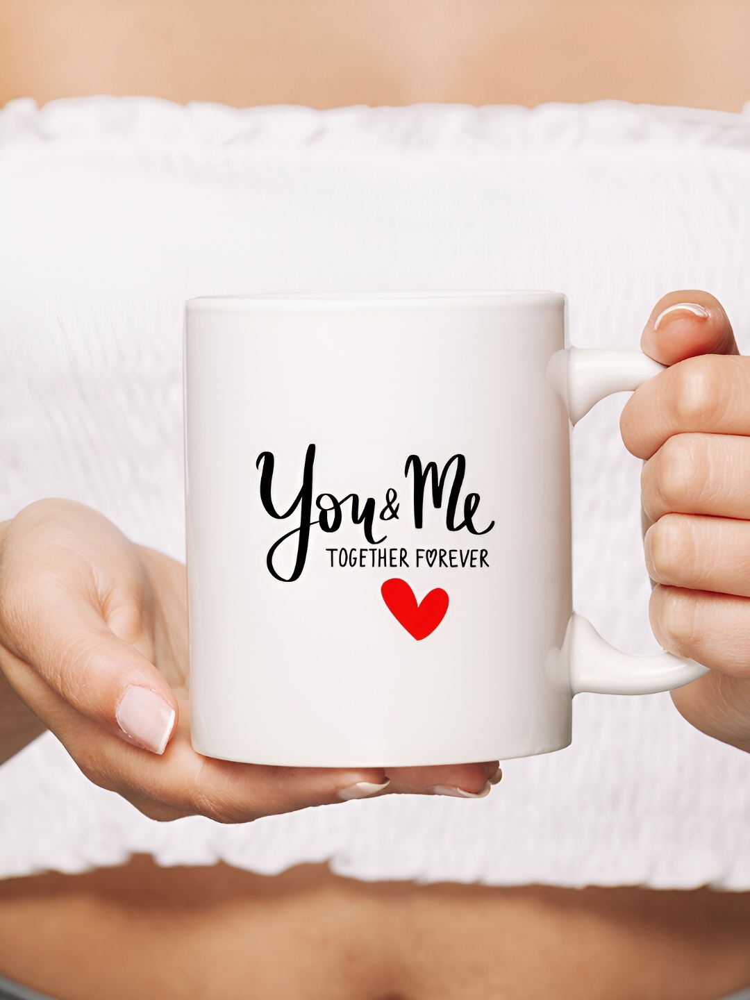

The Decor Lane White & Black Printed Ceramic Glossy Mug 325 ml