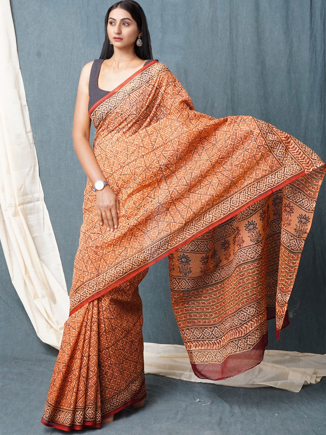 

Unnati Silks Geometric Printed Silk Cotton Handloom Kota Saree, Orange