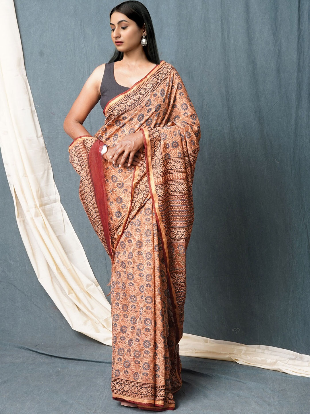 

Unnati Silks Ethnic Motifs Printed Zari Handloom Chanderi Saree with Tassels, Brown
