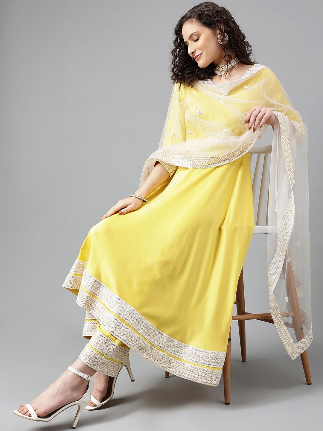 

Khushal K Women Ethnic Motifs Embroidered Empire Thread Work Kurta with Palazzos & With Dupatta, Yellow