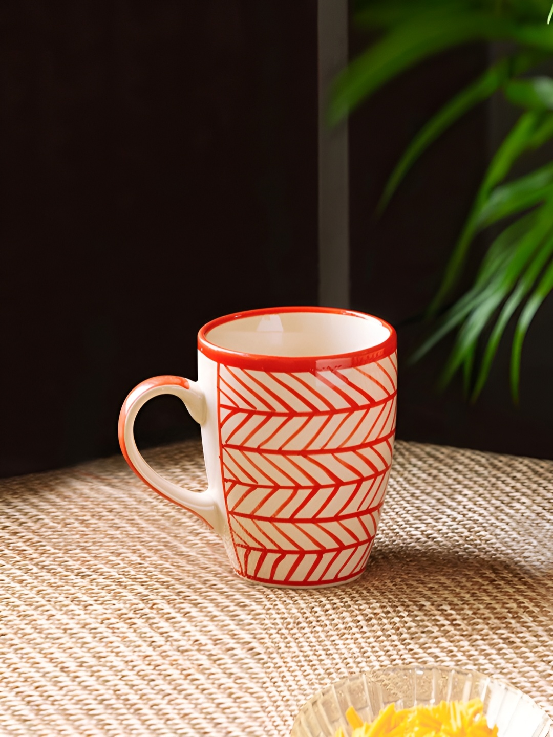 

ExclusiveLane Red & Off White Printed Ceramic Glossy Tea & Coffee Mug 260 Ml