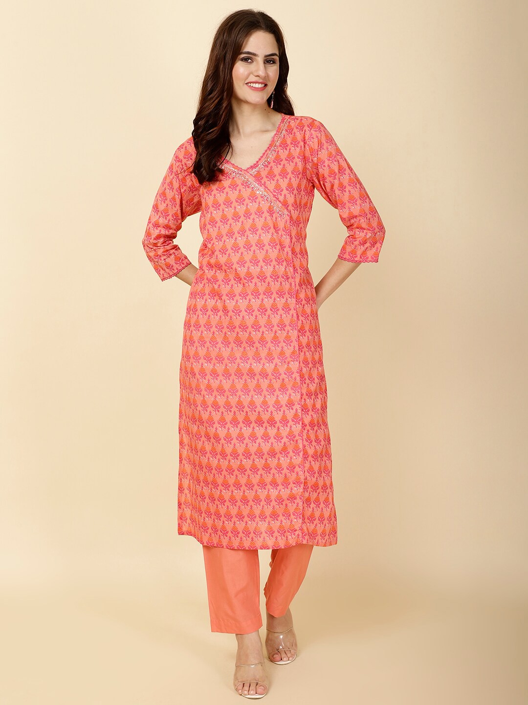 

Meena Bazaar Floral Printed Regular Sequinned Angrakha Style Kurta With Trouser, Peach